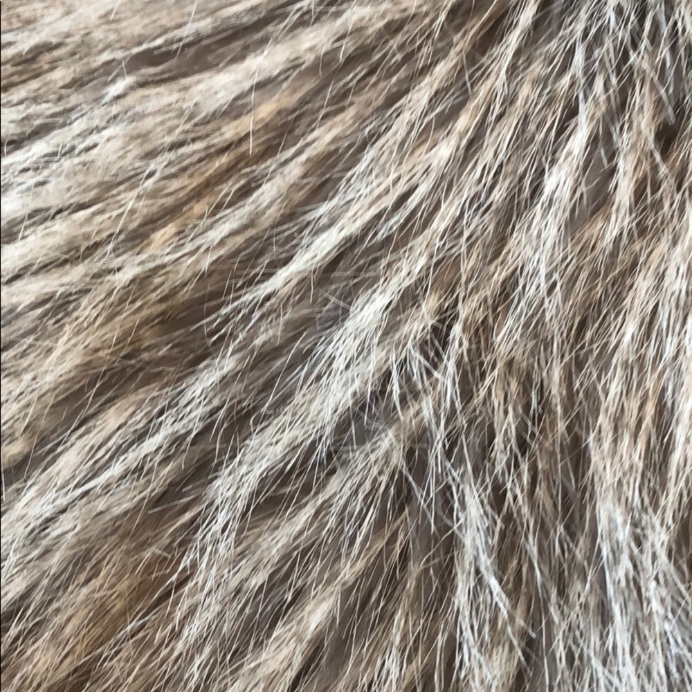 Large faux fur scarf tags on. Limited